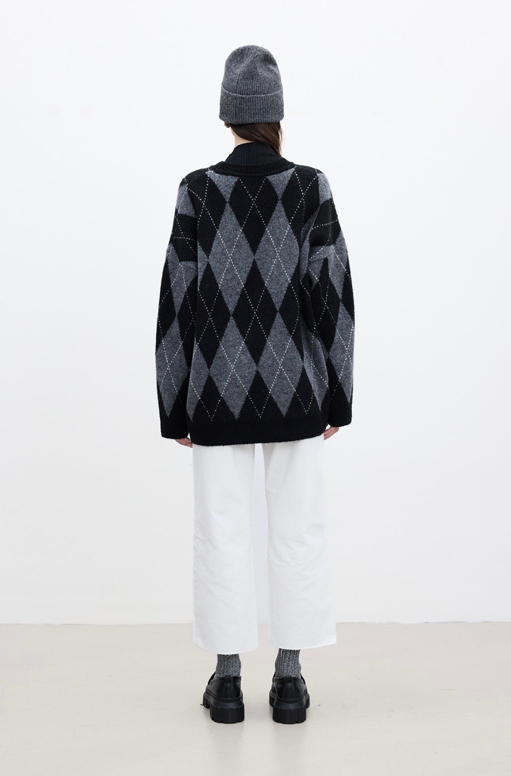 MANUKA - Oversize Strickpullover mit Karomuster Schwarz